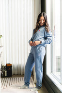 Person wearing pant suit in blue jean colour